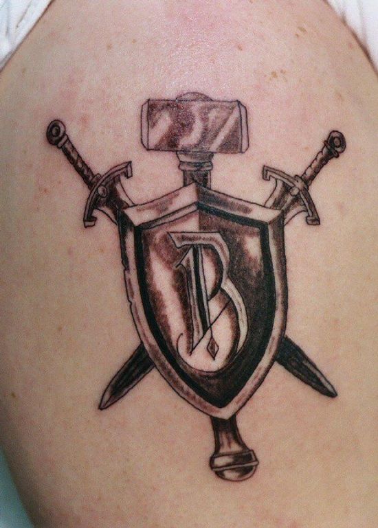25 Powerful Shield Tattoo Designs 25 Powerful Shield Tattoo Designs