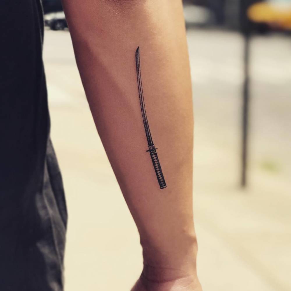 Katana Tattoo Located On The Inner Forearm Katana Tattoo Located On The Inner Forearm