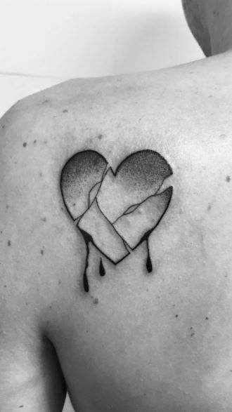 The 9 Best Broken Heart Tattoos In 2023 Ideas Meaning The 9 Best Broken Heart Tattoos In 2023 Ideas Meaning